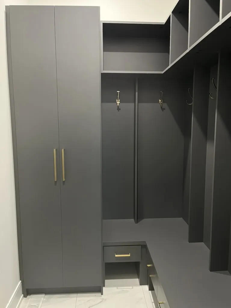 Custom mudroom locker wall with storage cubbies by Newood Millwork